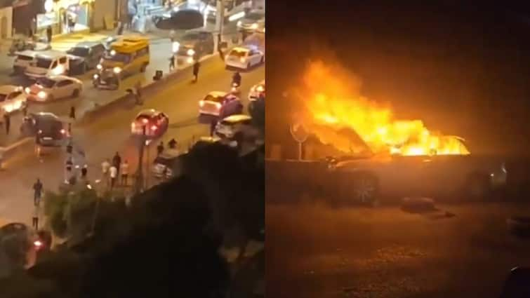 Israeli car enters West Bank near Jerusalem and Ramallah Palestinian mob burns